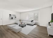 Thumbnail 8 of 40 - a living room with a white rug and couches