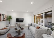 Thumbnail 26 of 135 - a living room with a white couch and a television