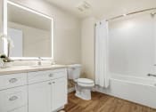 Thumbnail 8 of 50 - Bathroom with backlit LED vanity mirrors