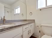 Thumbnail 59 of 102 - Bathroom With Granite Countertops