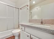 Thumbnail 55 of 61 - Bathroom with Granite Countertops