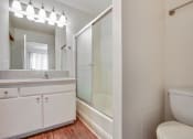 Thumbnail 54 of 61 - Bathroom With Wood Inspired Flooring