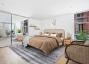 Thumbnail 5 of 86 - a bedroom with a bed and a sliding glass door