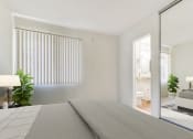 Thumbnail 14 of 17 - a white bedroom with a bed and a bathroom
