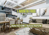 Thumbnail 1 of 45 - A room with a dining table and chairs is on sale with studios starting from $1,200 and 1-bedrooms from $1,700.