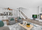 Thumbnail 2 of 21 - a living room with couches a coffee table and a tv