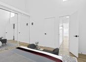 Thumbnail 20 of 21 - a bedroom with a bed and a mirror