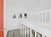 Thumbnail 4 of 21 - a bedroom with a bed and a desk in a room
