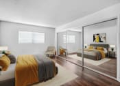 Thumbnail 4 of 8 - a bedroom with two beds and a large mirror