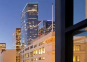 Thumbnail 38 of 45 - a view of a city skyline from a balcony