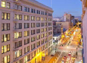 Thumbnail 39 of 45 - a large building in the middle of a city