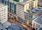 Thumbnail 40 of 45 - a view of a city from the top of a building