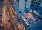 Thumbnail 42 of 45 - an aerial view of a city street at night
