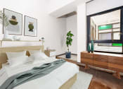 Thumbnail 7 of 45 - a bedroom with a large bed and a large window