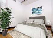 Thumbnail 6 of 37 - Downtown Los Angeles, CA Pet-Friendly Apartments - Mercantile Lofts - Bedroom With Bamboo Wood Flooring