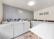 Thumbnail 29 of 30 - Laundry area