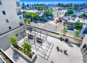 Thumbnail 41 of 75 - an aerial view of an apartment complex with a construction site in the background