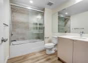 Thumbnail 47 of 75 - a bathroom with a toilet sink and shower