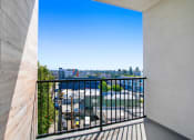 Thumbnail 66 of 75 - a balcony with a view of the city
