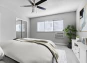 Thumbnail 18 of 52 - an expansive bedroom with a large bed and a ceiling fan