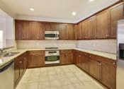 Thumbnail 1 of 10 - Kitchen With Stainless Steel Appliances