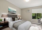 Thumbnail 41 of 76 - Bedroom with wood-inspired floors, sliding window