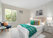 Thumbnail 28 of 76 - Bedroom with air conditioning, wood-inspired floors, sliding window