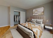 Thumbnail 7 of 29 - a bedroom with a bed and a closet