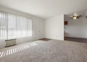 Thumbnail 25 of 48 - Living room with carpeted flooring, air conditioning