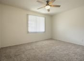 Thumbnail 27 of 48 - Bedroom with carpeted flooring, and ceiling fan