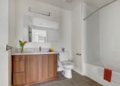 Thumbnail 21 of 26 - a bathroom with a toilet sink and bathtub
