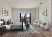 Thumbnail 5 of 38 - a bedroom with a bed and a chair in a room