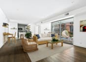 Thumbnail 2 of 86 - a living room with a couch and a coffee table