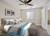 Thumbnail 15 of 52 - a bedroom with a bed and a ceiling fan