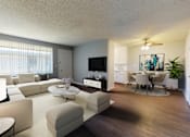 Thumbnail 2 of 9 - A living room with a white couch and a television.