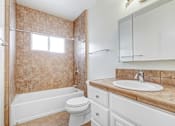 Thumbnail 13 of 13 - a bathroom with a sink toilet and a bath tub