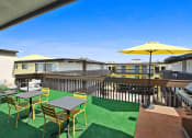 Thumbnail 16 of 22 - Sundeck with a grass mat flooring