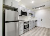 Thumbnail 3 of 42 - Kitchen at SkyLA Tower Apartments
