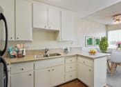 Thumbnail 12 of 22 - Kitchen With a double sink, small breakfast bar