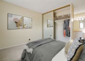 Thumbnail 14 of 22 - Bedroom with a mirrored closet doors