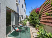 Thumbnail 9 of 22 - Beautiful Patio with lush landscaping