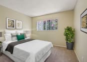 Thumbnail 7 of 22 - Bedroom with carpeted floors