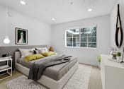 Thumbnail 6 of 25 - a bedroom with a bed and a window