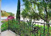 Thumbnail 37 of 88 - a balcony or terrace with a view of a garden