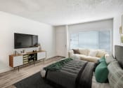 Thumbnail 3 of 61 - a living room with a couch and a tv