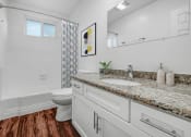 Thumbnail 52 of 57 - a bathroom with a sink and a toilet