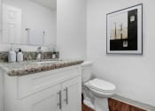 Thumbnail 54 of 57 - a bathroom with a sink and a toilet