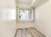 Thumbnail 17 of 33 - Dining area with wood inspired floors