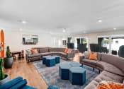 Thumbnail 54 of 64 - a living room with couches and chairs and a dining room with a table