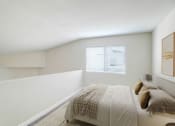 Thumbnail 4 of 61 - a white bedroom with a bed and a window